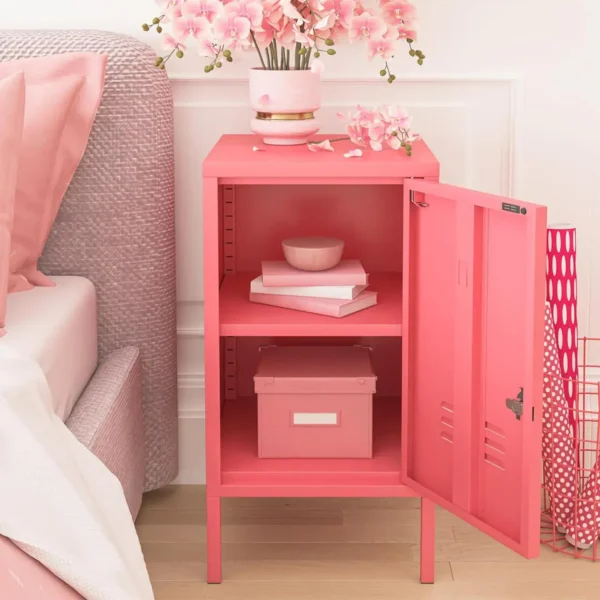 Pink metal bedside locker with open doors displaying inner shelves