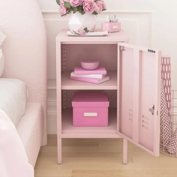 Pink metal bedside locker with open doors showing inside drawer and shelf