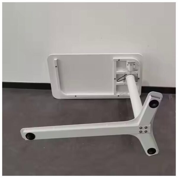A disassembled white side table placed upside down showing its base and structural details