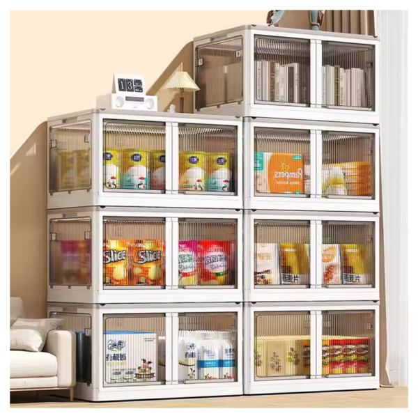 Stacked corner storage cabinet with clear doors, displaying snacks, diapers, and books in a living room