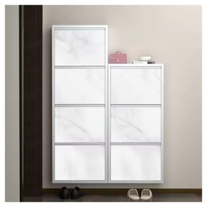 Modern white marble storage cabinet with sleek drawers in a minimalistic entryway