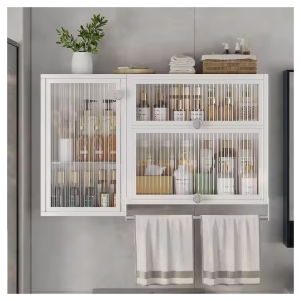 White storage cabinet with glass doors, showcasing perfumes, cosmetics, and other items, with towel racks below.