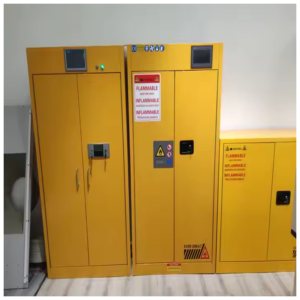 Yellow flammable storage cabinets with warning labels and safety signs